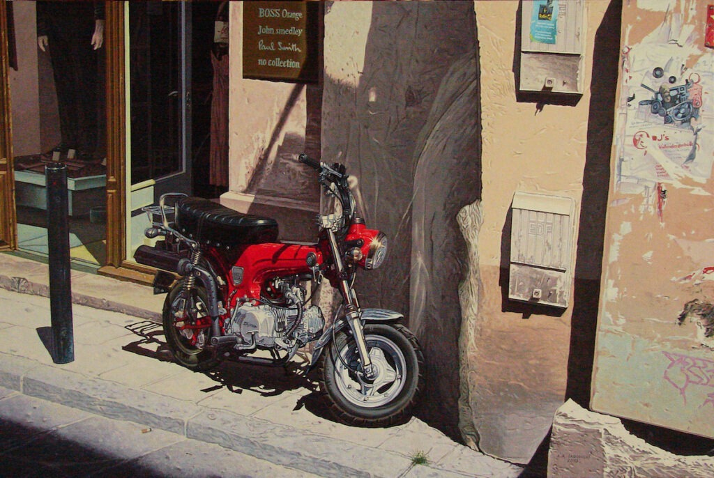 Arles - czerwony Sky Team 125 - Andrzej Sadowski - hiperrealizm, motocykl, uliczka